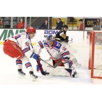 Kitchener Rangers' Andrew MacNiel and Jackson Parsons in action