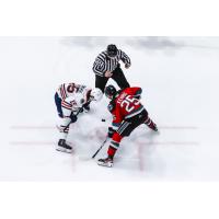 Kamloops Blazers' Ty Bonkowski versus Kelowna Rockets' Jaxon Kehrig