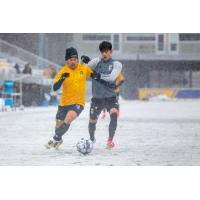 Robbie Mertz of the Pittsburgh Riverhounds (left) vs. Columbus Crew 2