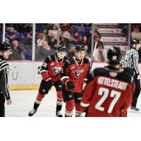 Vancouver Giants right wing Tyus Sparks (center) vs. the Prince George Cougars