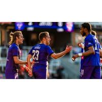 Louisville City FC forward Sam Gleadle (center)