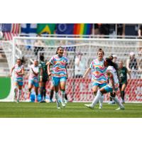 San Diego Wave FC midfielder Kenza Dali (center) celebrates her goal