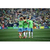 Seattle Sounders FC's Kalani Kossa-Rienzi, Danny Musovsk, and Jesús Ferreira on game night