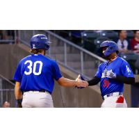 Tulsa Drillers Damon Keith congratulates Jose Ramos after a homer