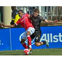 Sergei Kozlovskiy of Atlético Ottawa (right) vs. Cavalry FC