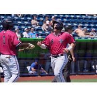 Pensacola Blue Wahoos outfielder Dalvy Rosario (left) and third baseman Josh Zamora