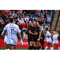 Portland Thorns FC react after a goal against Racing Louisville FC